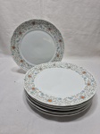 Jogo de 6 pratos de mesa em porcelana Real flores azuis.  Medindo 24cm de diâmetro.