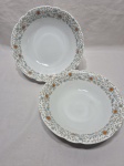 Jogo de 2 travessas redonda funda em porcelana Real flores azuis. Medindo a maior 24cm x 6,5cm de altura.