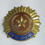 Antigo Distintivo de Quepe da Polícia Militar do Rio de Janeiro. Metal com esmalte. Medida: 5,5 cm de diâmetro. Conforme fotos.