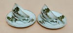 REAL - Antigo par de xícara com seu respectivo pires para chá  em porcelana pintada a mão filetado a ouro - 05x11 cm a xícara e 14 diam o pires - com desgastes no filete.