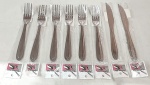 Lote composto por 8 talheres de mesa em inox - sendo 6 garfos 19x2,5 cm - e 2 facas 22 cm - sem uso-lacrado.
