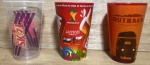 Lote composto por 3 copos promocionais - 1 Delegação Skol, 1 Brahma Copa do Mundo 2014 e 1 Outback Coca-Cola.