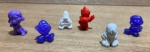 Lote composto por 6 bonecos Googos em modelos e cores variadas conforme foto.