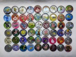 54 tazos antigos conténdo do YU-GI-Oh - Pokémon e do Bob Esponja