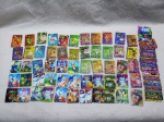 Lote com mais de 60 tazos / card colecionáveis do Digimon, pokémon, Kung Fu Panda e conexão alien