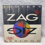 Disco de vinil Zig Zag Hooters em bom estado de conservação