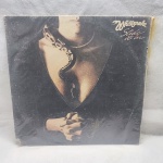 Disco de vinil Whitesnake Slide it in em bom estado de conservação