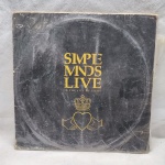 Disco de vinil Simple Minds Live em bom estado de conservação