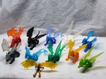 Onze miniaturas de dragões da coleção Reino dos Dragões, da revista Recreio