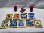 Três bonecos do bakugan acionáveis e cards com chapa de ferro