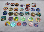 Lote de tazos e peões da liga da justiça, yu-gi-oh e chester cheetos