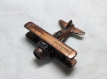 Miniatura de apontador em formato de avião