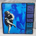 Disco de Vinil Guns n' Roses Use your illusion lI com encarte, item em muito bom estado de conservação
