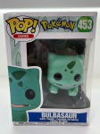 Funko Pop - Pokémon ( Bulbasauro ) na caixa, no estado das fotos
