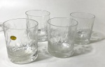 Quatro copos para wisky lapidados á mão. Medidas: 9 cm