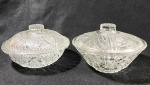 Duas compoteiras de vidro prensado. Medidas: 11,5 x18 cm diâmetro e 10,5 x 18 cm