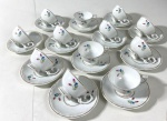 SCHIMIDT - Doze xícaras de café com seus respectivos pires em porcelana nacional