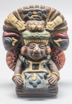 ESCULTURA - ARTE POPULAR - Indigena em cerâmica, policromada. Med. 12x10x6 cm. Marcas do tempo.
