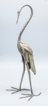 ESCULTURA - Escultura produzida em metal, representando garça, altura 33 cm, item decorativo.