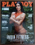 Revista Playboy nº486   2015  Cintia Vallentim (Índia Fitness) Capa com Cintia Vallentim, a Índia Fitness, em um ensaio sensual que promete encantar até o mais exigente pajé. Destaques incluem entrevista reveladora com Luana Piovani, explorando temas como polícia, família, Santoro e Caetano; moda descomplicada com o chef Henrique Fogaça; viagem ao coração do whisky escocês; e uma matéria provocante sobre o fascínio pelo sexo oral. Também traz o irreverente Antonio Tabet (Porta dos Fundos) no quadro 20P. Edição vibrante e provocadora, ideal para colecionadores e fãs da cultura pop brasileira.