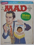 MAD Brasil  Edição nº 83 Uma capa provocativa e escrachada, típica do estilo MAD, que satiriza a corrupção política com humor ácido. O Saco de Vômito Collorido e o relatório ETA são alfinetadas diretas ao cenário brasileiro da época, misturando crítica social com irreverência gráfica. Uma edição que não economiza na ironia.