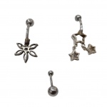 Três piercings em aço inox ,um com estrela, outro com flor e um com pedra facetada.