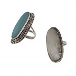 Dois anéis femininos em prata sendo um com água marinha aro 27 e outro com opalina aro 23, 21,1 g. bruto.