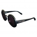 Óculos de sol feminino Carmen Steffens UV400 Protection modelo 0036.582.001S, marcas de uso.