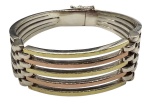Bracelete em prata de lei, ouro amarelo e rose. Diâmetro: 17,5cm Peso: 49,5g