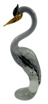 Escultura em vidro de murano italiano no feitio garça-moura, em tons de branco, negro e ambar. Altura: 30cm Comprimento: 11cm Largura: 8,5cm