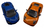 Colecionismo - Lote composto por dois carros, sendo um Lamborghini Murciélago e outro Lamborghini Revuelto em metal com partes em material sintético. Fricção nas rodas. Pintura automotiva. As portas abrem. Escala 1:36 e 1:38 (respectivamente).