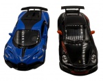 Colecionismo - Lote composto por dois carros, sendo um Bugatti Divo e outro Porsche 911 GT3 RS, ano 2010. Ambos em metal com partes em material sintético. Fricção nas rodas. Pintura automotiva. As portas abrem. Escala 1:36