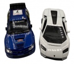 Colecionismo - Lote composto por dois carros, sendo um Subaru Impreza WCR, ano 2007 e outro Lamborghini Countach LPI 800-4,  Ambos em metal com partes em material sintético. Fricção nas rodas. Pintura automotiva. As portas abrem. Escala 1:36 e 1:38 (respectivamente)