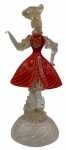 Estatueta de murano italiano representando ''Jovem da Nobreza'' com pó de ouro. Altura: 25,3cm Comprimento: 11cm.