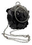 Curiosa bolsa em metal dos anos 70 no formato de esfera, decorada por paetês, alça redonda incrustada por cristais. Acompanha alça longa. EM PERFEITO ESTADO! Diâmetro da esfera: 14,5cm Comprimento com alça redonda: 30,5cm 72cm