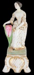 Viex Paris - Escultura de porcelana francesa Velho Paris representando dama com vaso de flores. Altura: 32cm