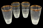 Quatro longos copos em fino cristal europeu decorado por borda dourada. Altura: 14cm Diâmetro: 7,5cm