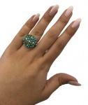 Anel em ouro 18k cravejado por brilhantes e turquesas. Aro: 18 Peso: 8g