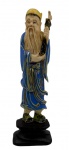 Escultura de marfim policromado, representando figura masculina oriental. Base de madeira. Altura: 15 cm