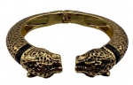 Bracelete folheado ouro no feitio de pantera com detalhes esmaltados.