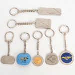 MILITARIA, sete (7) chaveiros distintos, com motivos da aeronáutica, sinais de uso, vide foto.