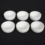 PORCELANA, seis (6) manteigueiras individuais, tipo bowl, tonalidade branca, manufatura SCHMIDT (Pomerode, SC; Mauá, SP; Campo Largo, PR, fundada em 1945, ainda em atividade, maior fábrica de porcelana da América Latina), medindo 6 cm diâmetro e 3 cm altura, vide foto.
