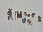 Lote de 7 broches em metal de diversas procedências.