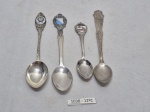 Lote de 4 colheres em prata 90 com brasão, para colecionador. Medindo 11cm de comprimento.