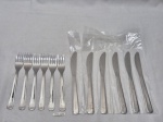 Jogo de 12 talheres de sobremesa em aço inox Hercules, da antiga cia aérea Varig Rio Sul. Medindo o garfo 16cm de comprimento, faca 19cm de comprimento.