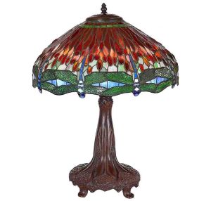 "<b>Abatjour</b>" estilo Tiffany, com cúpula em vitral policromado com composição floral e elementos fitomórficos em tons de verde, azul e vermelho. Base em metal patinado, ricamente trabalhada em relevo com motivos escamados e volutas. Alt. 80 cm