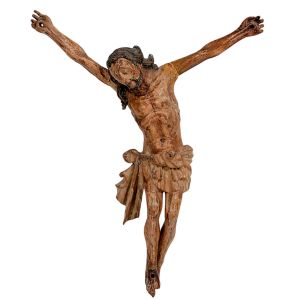 <b>Cristo crucificado </b>esculpido em madeira, com vestígios de policromia original. Representação de Cristo com perizônio esculpido em movimento e expressão serena voltada para baixo. Alt. 20 cm