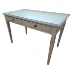 Mesa de encostar dita bureaux com tampo retangular apoiada em pernas retas com duas gavetas centrais, Com. 110, Prof. 64, Alt. 76 cm.