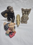 Lote de 4 enfeites na forma de animais em resina e pedra. Medindo o maior 10cm de altura.