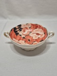 Pequena fruteira em porcelana Weiss pintura floral e friso ouro. Medindo 13,5cm x 6cm de altura.